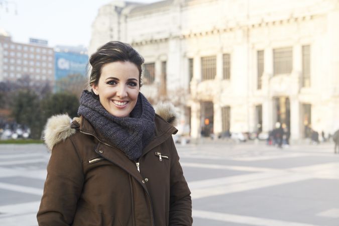 Portrait of young woman in the city