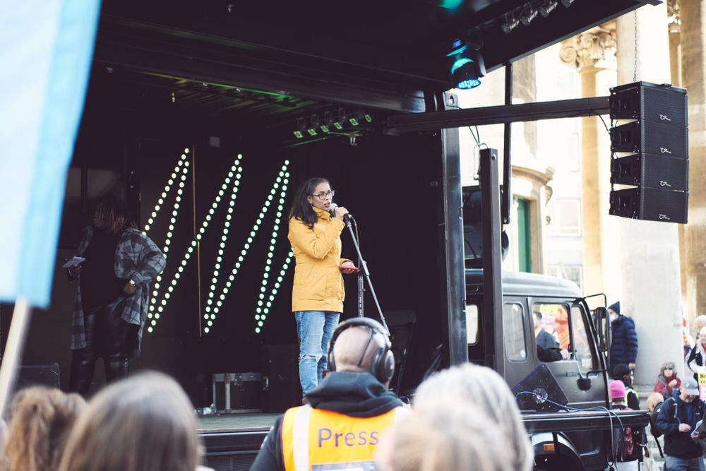London, England, United Kingdom - March 19 2022: Black woman addressing protestors from the stage