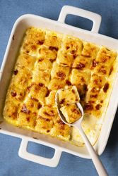 Close up of roasted cheese gnocchi in a dish