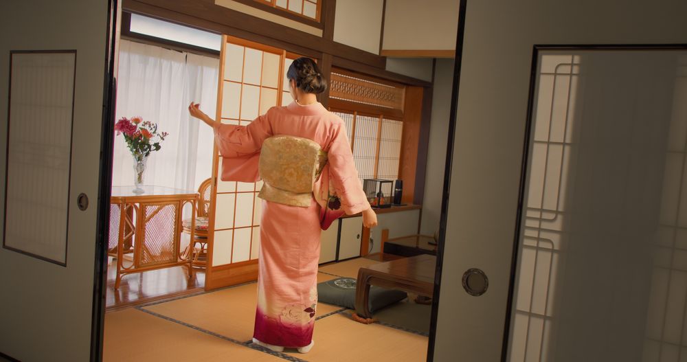 Portrait of a Japanese Model Posing in Pink Kimono Outfit.