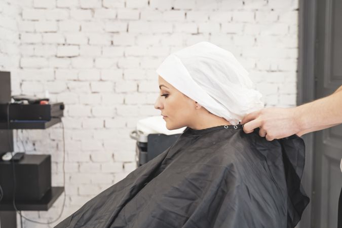 Stylist washing hair