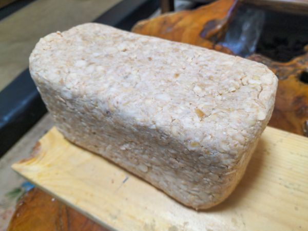 Boiling Yellow Soybeans in a Traditional Pot