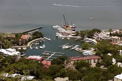 Aerial view of the marina and Harbour Town Lighthouse in Hilton Head Island, South Carolina QbD1V0