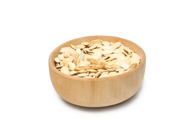 Concept of Autumn vibe food, Pumpkin, Pumpkin seeds, isolated on light background