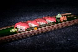 Delicious sushi set served on wooden tray
