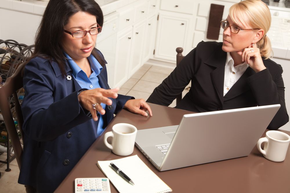 Businesswomen Working on the Laptop