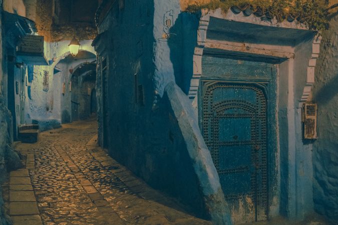 Old narrow street of town at night