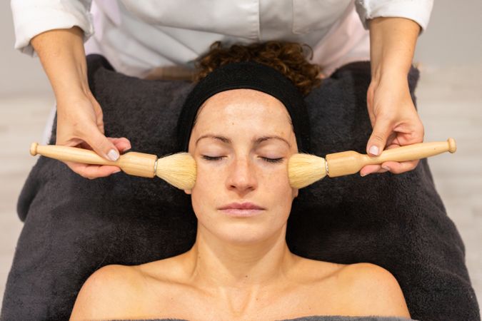 Female client receiving beauty treatment