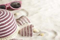 Pink hat in fine sand