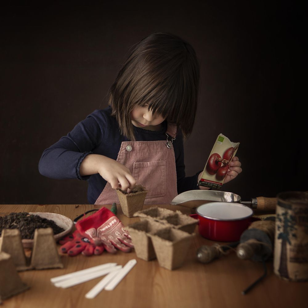 Girl preparing for planting seeds