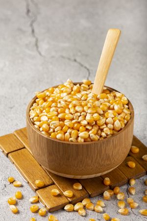 Dried corn. Raw corn for popcorn on the table.