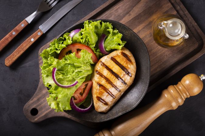 Tasty grilled chicken with salad.