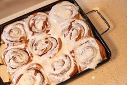 Delicious cinnamon rolls in baking pan