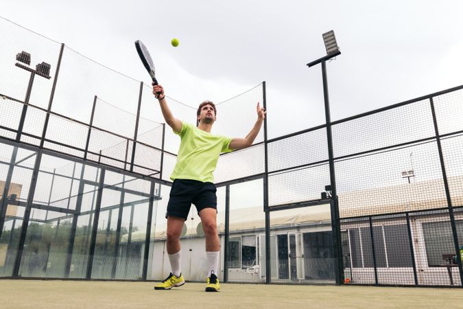 Young man playing paddle tennis