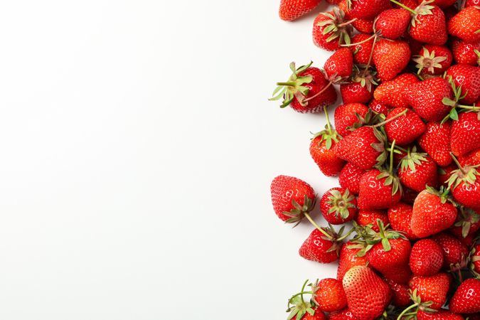 Tasty red strawberry on plain background, space for text. Summer berry