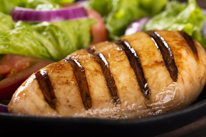 Tasty grilled chicken with salad.
