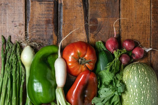 Fresh organic vegetables on a dark wooden table