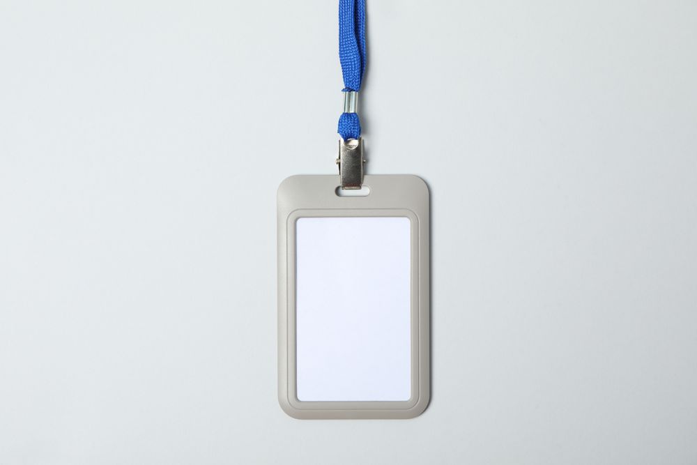 Empty name tag on light background, space for text