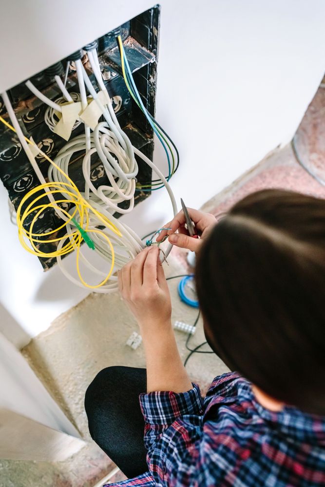 Unrecognizable female technician installing lan network