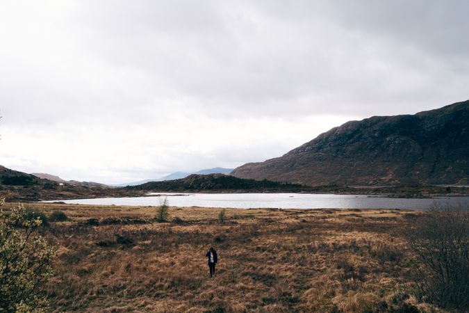 Traveling man in remote cold valley