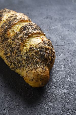 Loaf of bread with grains and poppy seeds