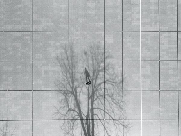 Aerial view of a man standing strong