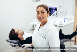 Confident female dentist in her clinic 4dGga5