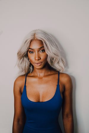 Charming Black woman in blue trendy dress