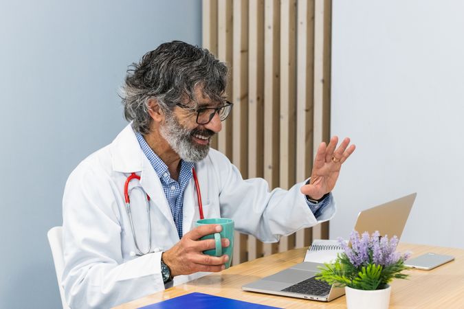Doctor conducting telemedicine consultation with patient