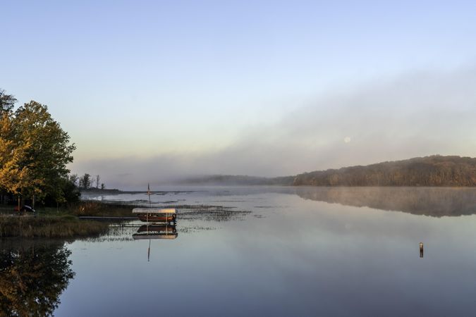Morning sun and fog at Sandy River Lake in McGregor, Minnesota