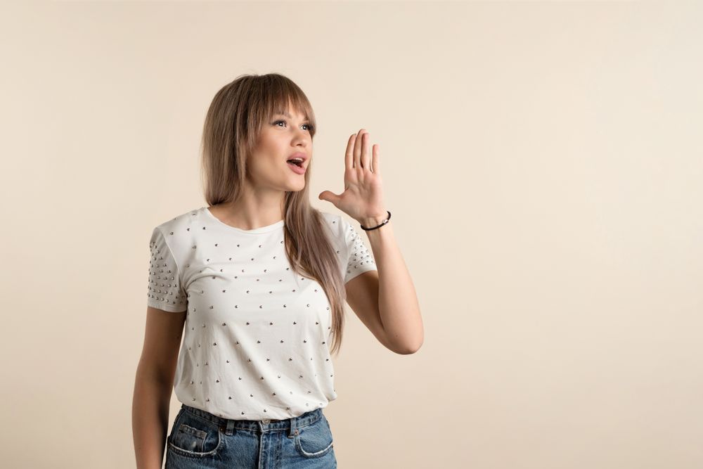 woman posing in pastel background
