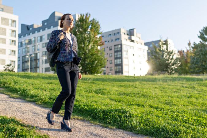 Female entrepreneur walking in park