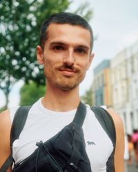 London, England, United Kingdom - August 27, 2022: Man with short hair and crystal tear drop