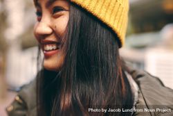 Close-up shot of young Asian woman smiling 0KyB74