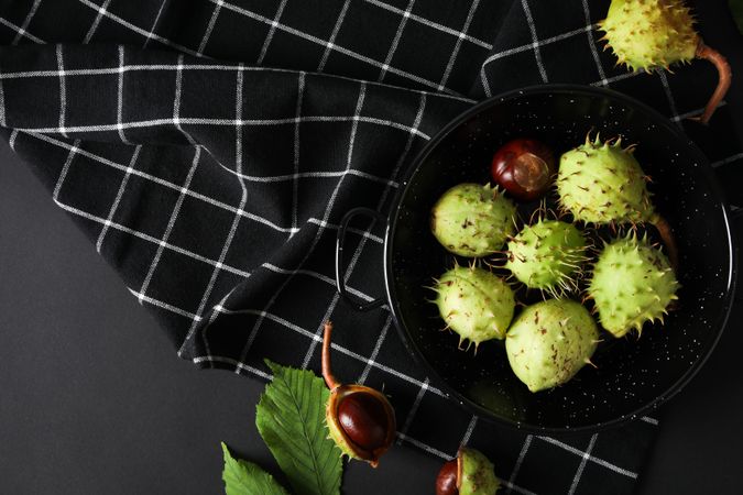 Fresh and ripe chestnuts, top view, Autumn chestnuts