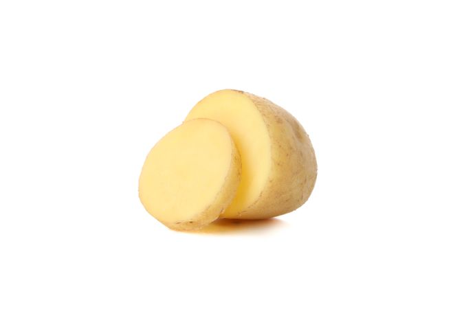 Potato on slice cut in bright room