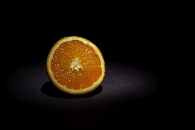 Fresh Oranges on dark background