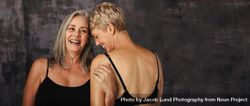 Two mature women in underwear embracing their natural bodies