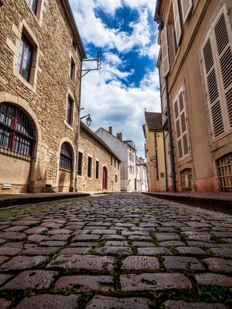 Empty streets of the medieval city of Beaune in Burgundy. The stormy sky
