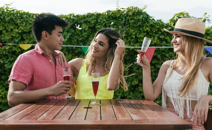 Group of friends drinking sangria on the terrace