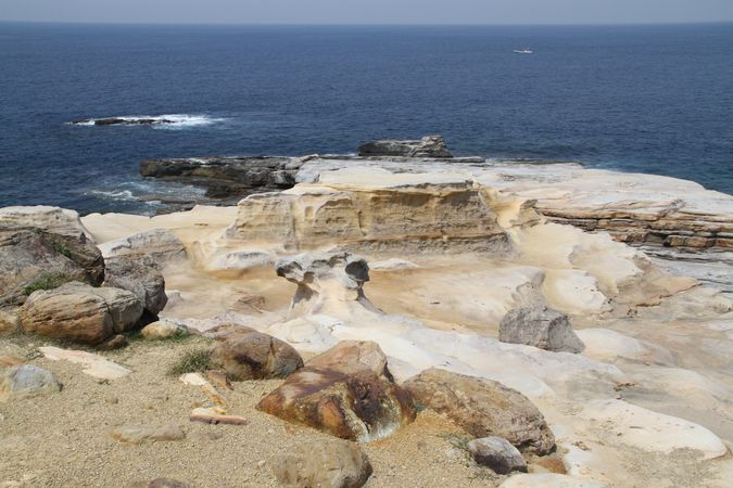 Rocky seashore during daytime