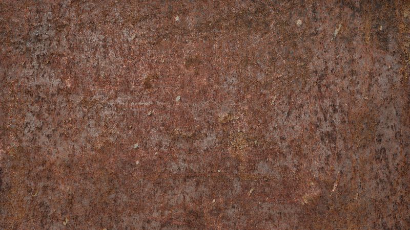 Reddish rusted steel surface with weathered industrial patina