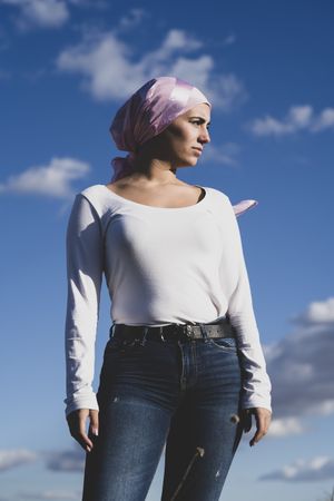 Young woman with cancer bandana