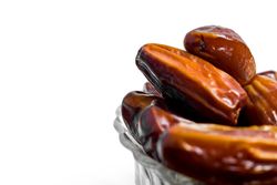 Close up fruits dates on isolated plain background