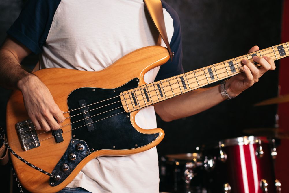 Close-up of a musician playing bass