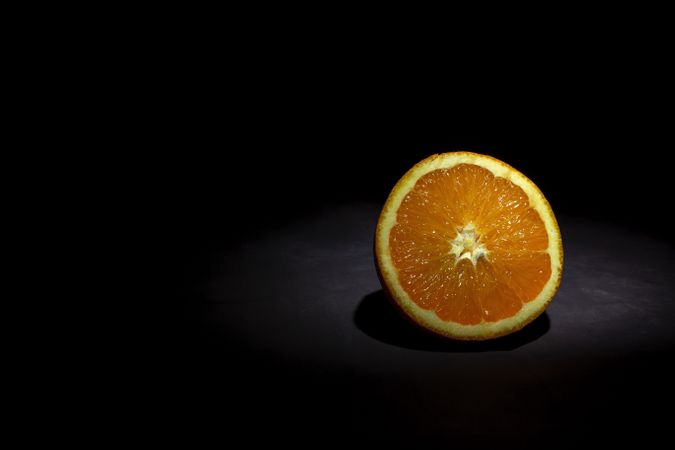 Fresh Oranges on dark background
