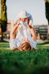 baby in the arms of his grandmother