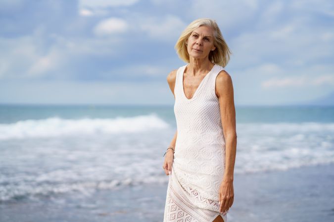 Portrait of mature female looking out to the ocean