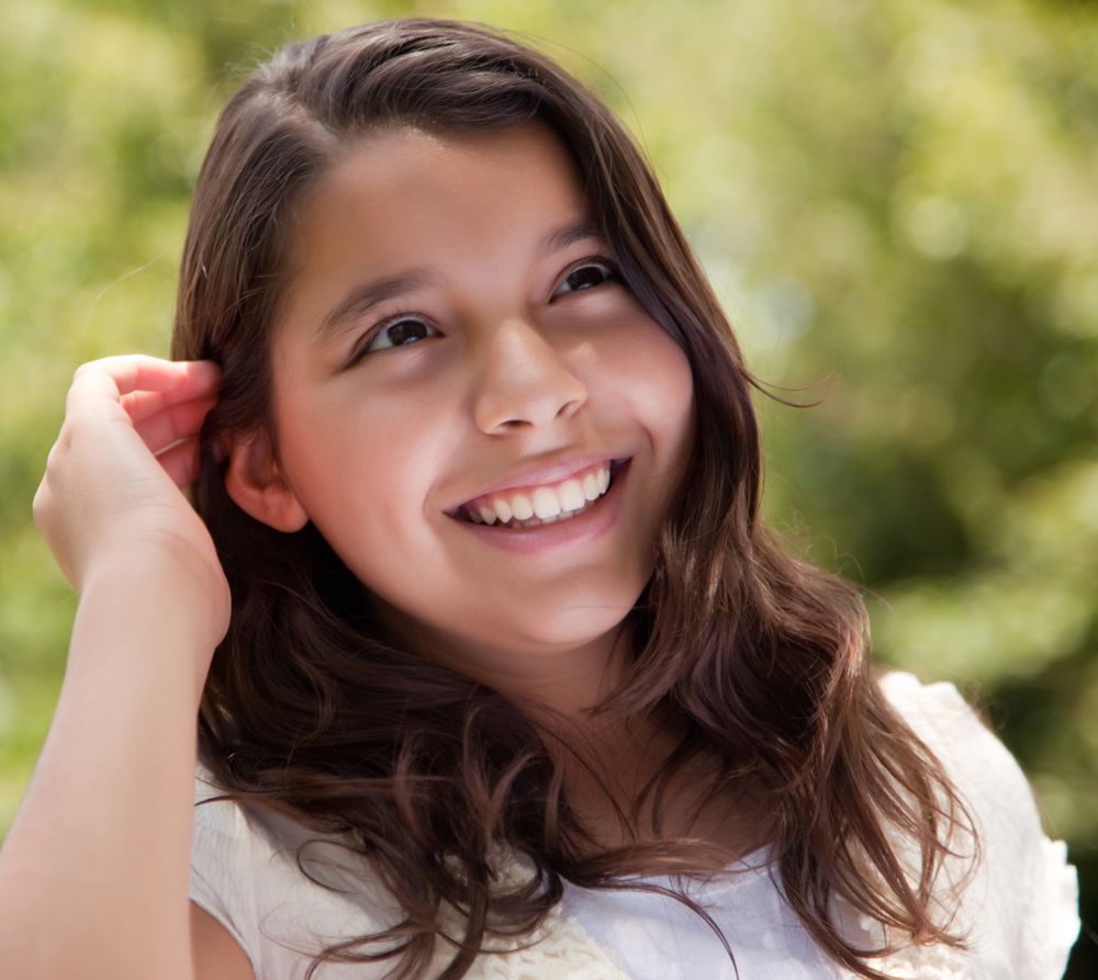 Cute Happy Girl in the Park