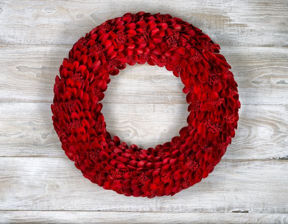 Wooden Red Wreath on aged boards